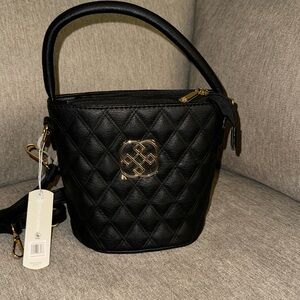 Black small bucket bag. New with tags.
